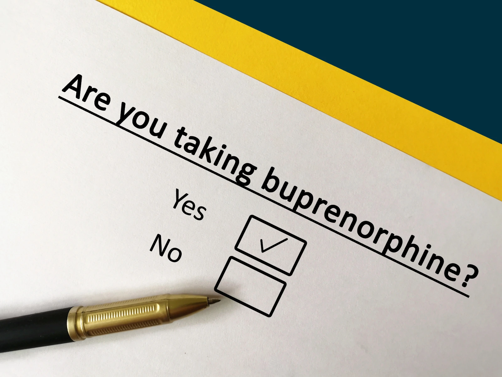 How Long Does Buprenorphine Stay In Your System? Form with question Are you taking buprenorphine? and checkboxes, Yes checked, with a pen on paper.